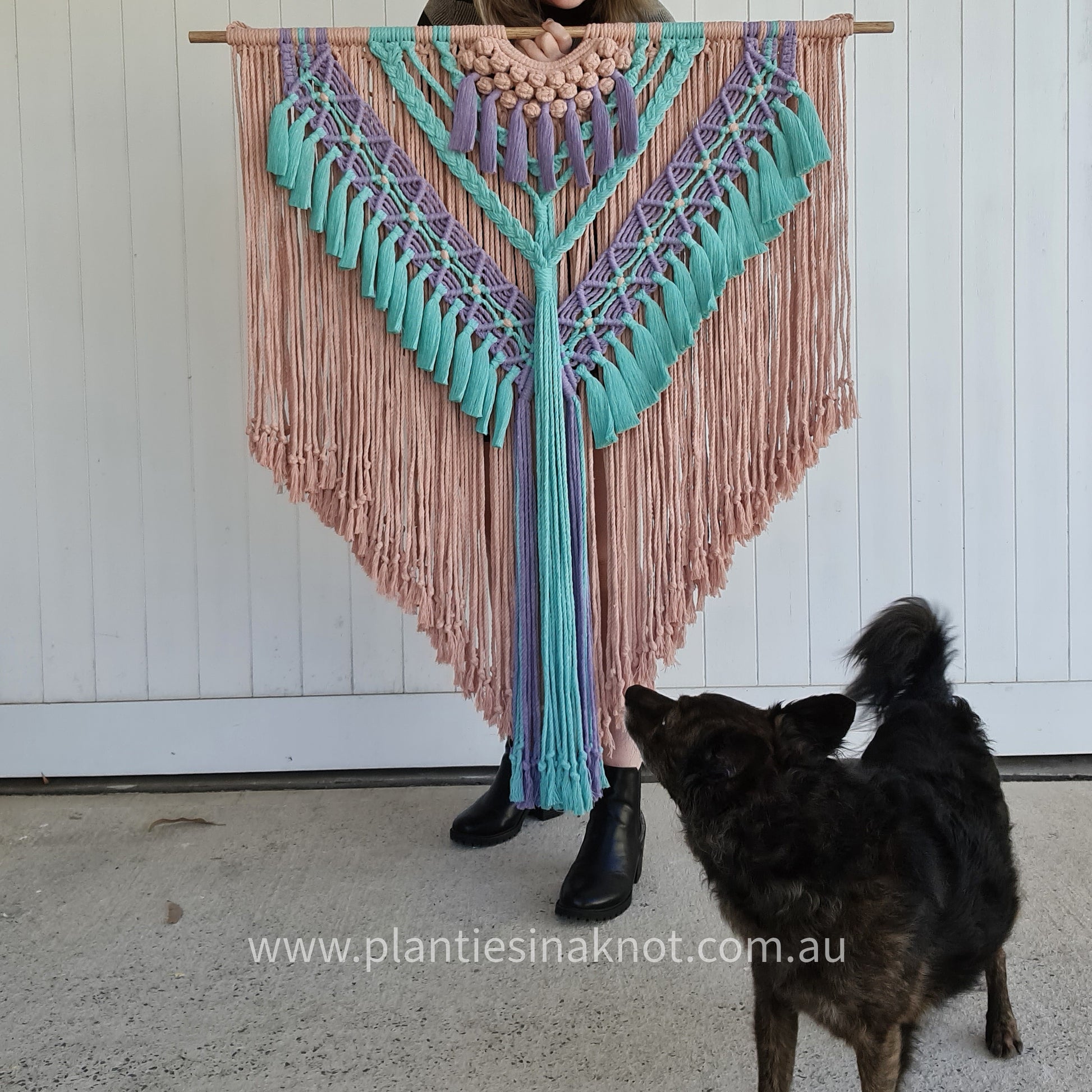 1 metre wide macrame wall hanging. Boho designs. Handmade using 100% recycled cotton. Cotton Colour: Blush Pink, Purple & Blue. Bright bubbly colours
