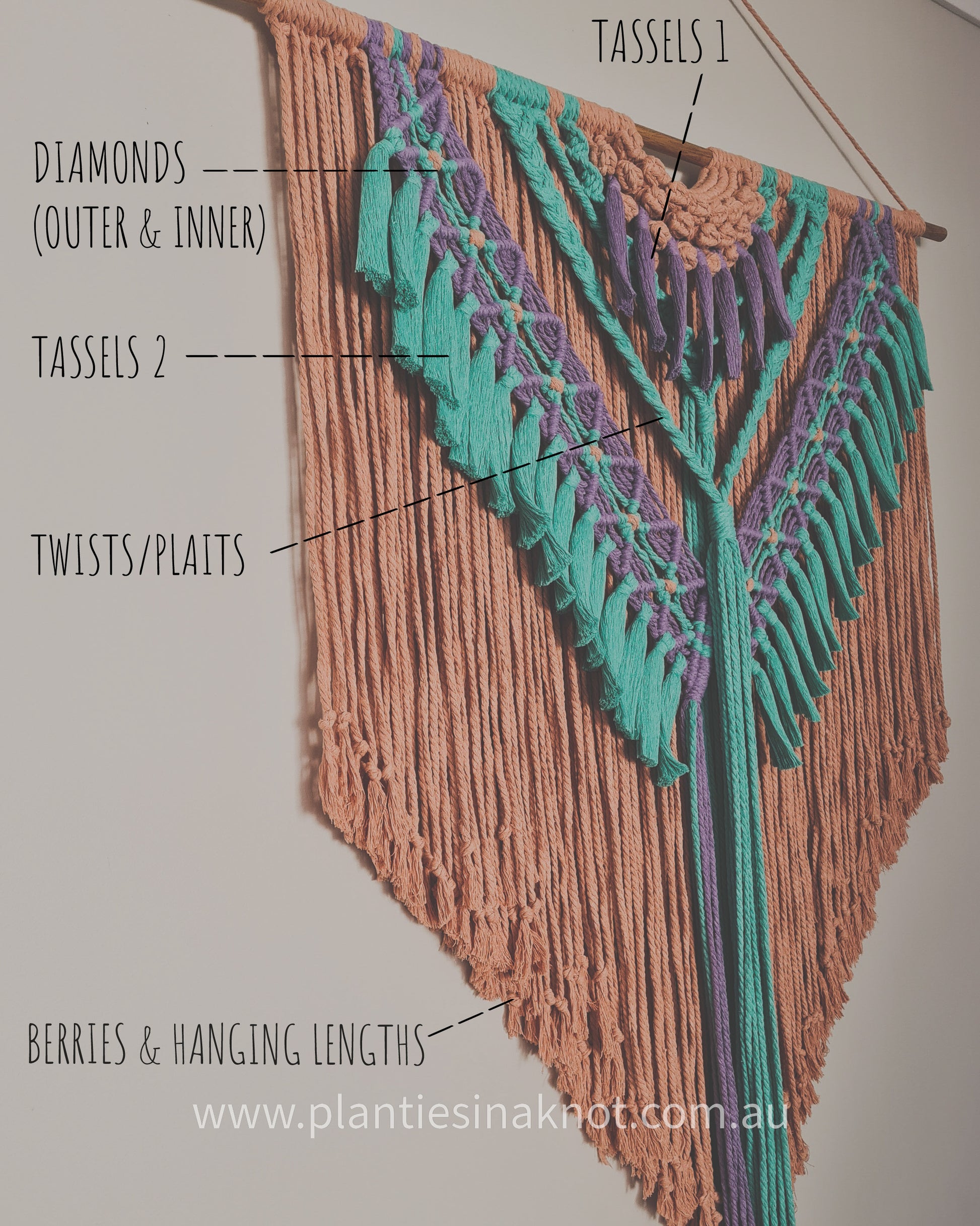 Photo with writing for sections. 
1 metre wide macrame wall hanging. Boho designs. Handmade using 100% recycled cotton.